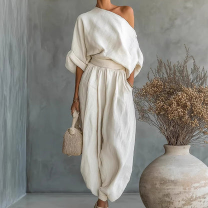 【MÁS VENDIDO】🔥1º en Trajes🔥Conjunto de top asimétrico de un solo hombro y pantalones para mujer: fluido, con bolsillos y cintura ajustada para una elegancia sin esfuerzo 👗✨