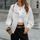 Chaqueta corta de lunares para mujer con cuello alto