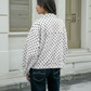 Chaqueta corta de lunares para mujer con cuello alto