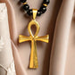 Collar colgante cruz vintage con perlas de hematita