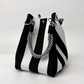 Bolso de mano de balde de punto a rayas