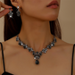 Conjunto de Collar y Aretes con Colgante de Lágrima Brillante