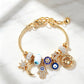 Pulsera con Dijes Celestiales de Sol y Luna