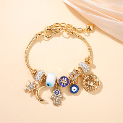 Pulsera con Dijes Celestiales de Sol y Luna